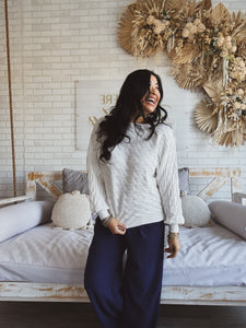 SEIZE THE DAY CABLE KNIT SWEATER